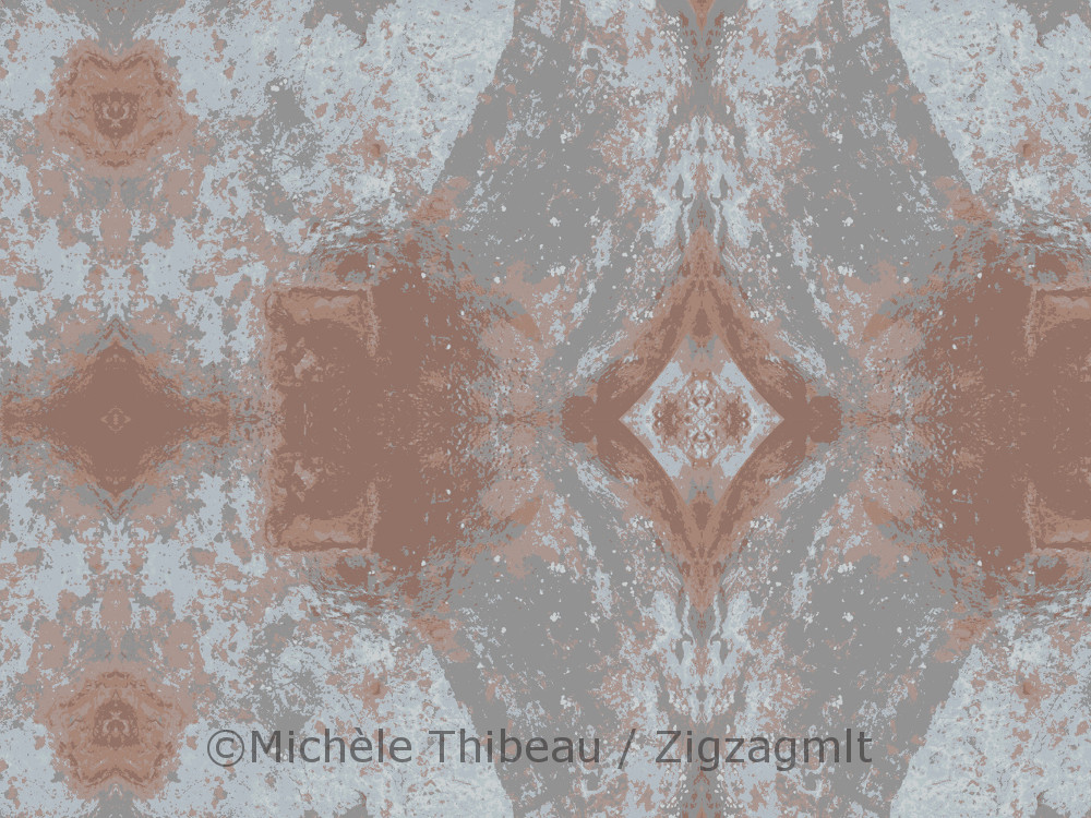 Gaspé Mixed Textures O This design plays up the greys, turning the oranges to browns. A subtle pattern of muted shapes and curves.